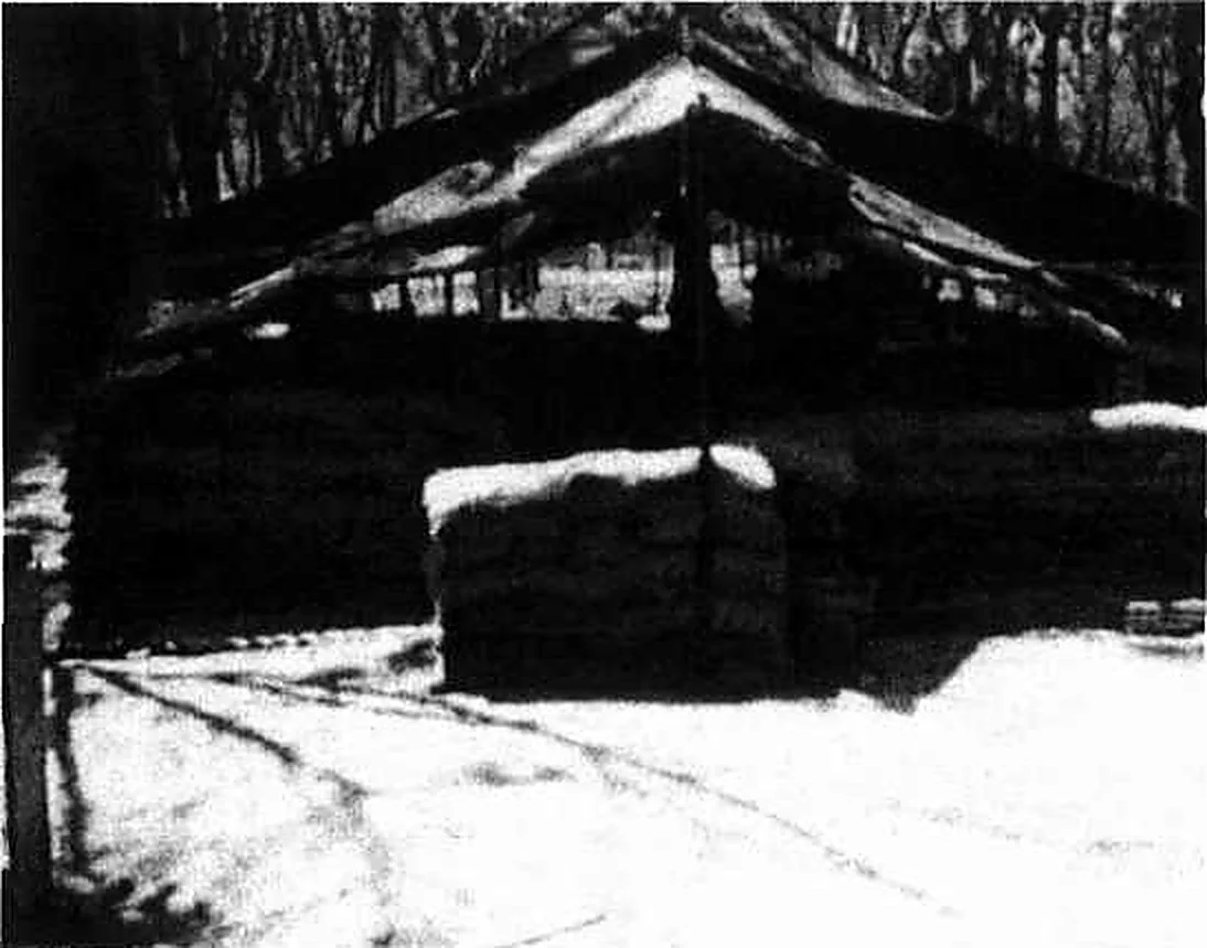 A tent over sandbagged walls — Mervyn Mason's living quarters at 5 RAR